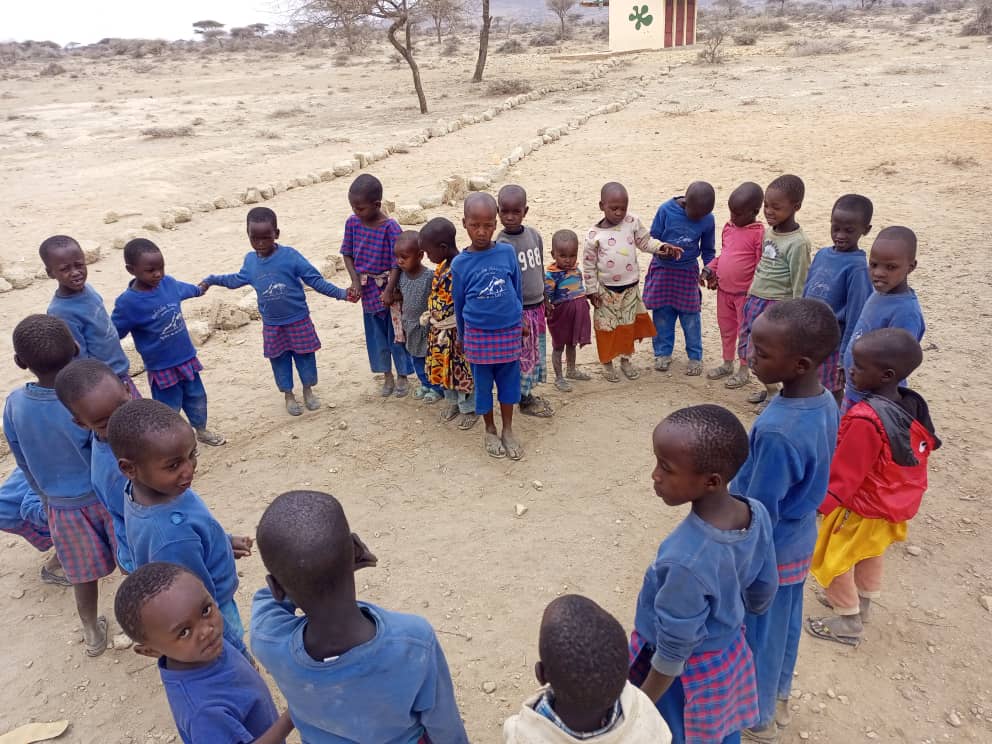 Maasai Kids forming a heart